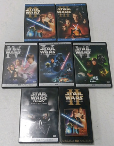 (3) Star Wars 2004 Cut Original Trilogy DVD (2) Star Wars EP 2-3 DVD (1) Star Wars Original Trilogy Bonus Material DVD (1) Star Wars EP 2 VHS
