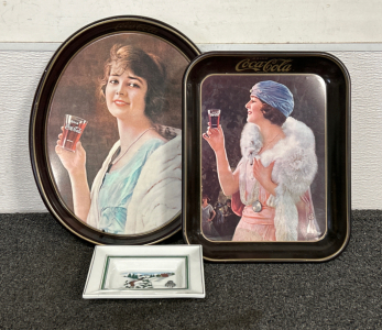 VINTAGE COCA-COLA TRAYS AND A 1980 ESTÉE LAUDER PORCELAIN SOAP DISH