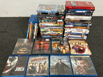 VARIOUS GENRES OF DVD AND BLU-RAY MOVIES INCLUDING STIGMATA, BIG LEBOWSKI, JOKER, TOP GUN AND MANY MORE