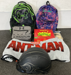 LIME GREEN UNDER ARMOUR BACKPACK, GREY UNDER ARMOUR LUNCH BOX, MARVEL ANT MAN BLANKET, MOTORCYCLE HELMET, RICK AND MORTY BACKPACK, WOODEN CATAPULT MODEL