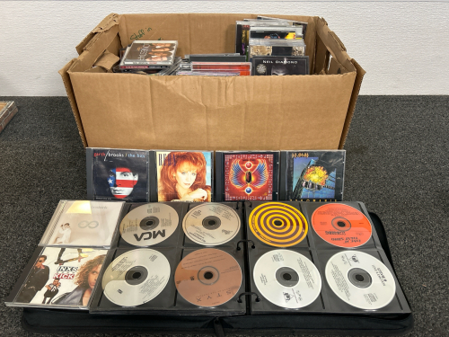 BIG CD BINDER (ALMOST FULL) AND BOX WITH CASES FOR CD’S-VARIETY OF GENRES