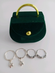 Two sets of hooped earrings