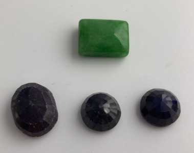 (1) Square Cut Emerald, (3) Sapphires