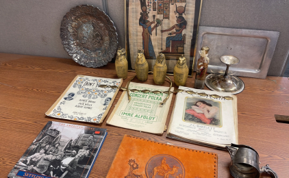 VINTAGE EGYPTIAN CAPONIC JARS, SILVER LIKE PLATES, SHEET MUSIC, BOOK.