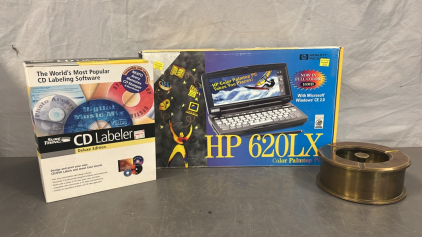 HP 620 LX COLOR PALMTOP PC, CD LABELER, AND BRASS LIKE PIECE