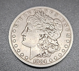1884-O US Morgan 90% Silver Dollar
