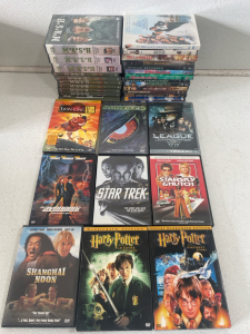 Box of DVD’s Including Mash, Harry Potter, & The Matrix