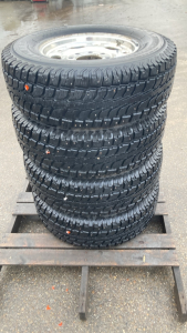WINTERCAT SNOW GROOVE TIRES ON 8-BOLT GM WHEELS