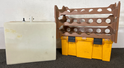 LARGE WATER CONTAINER, YELLOW TOOLBOX AND BOTTLE STORAGE RACK