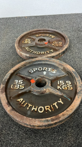 (2) 35 POUND METAL PLATES