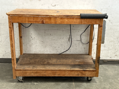 ROLLING WORK BENCH (48x38.5x24) WITH POWERSTRIP ATTACHED (WORKS, 2ND OUTLET NEEDS REPLACED)