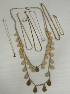 GOLD TONE FASHION NECKLACES, ANKLET AND RING WITH GREEN STONES (SIZE 10)