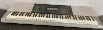 (1) Casio Electric Keyboard