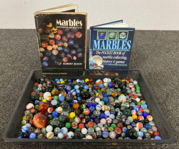 Large Assortment Of Marbles and (2) Books