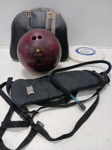 (1) Bowling Ball with Bag (1) Frisbee (1) Camel Bak Water Bag