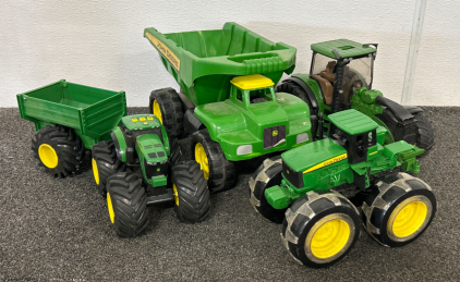 (4) Plastic John Deere Collectible Toys