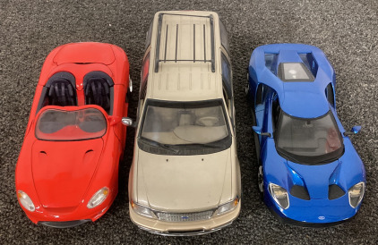 (1) Ford Expedition Die Cast, (1) 2017 Ford GT Die Cast, And (1) Mustang Mach 3 Die Cast