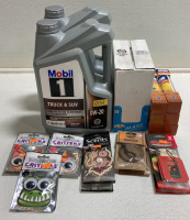 (2) Mobil 1 Truck/SUV 0W-20 Motor Oil, Box of Glass Wipes, (6) Vanilla Air Sanitizers, (12) Packs of Mirror Air Fresheners