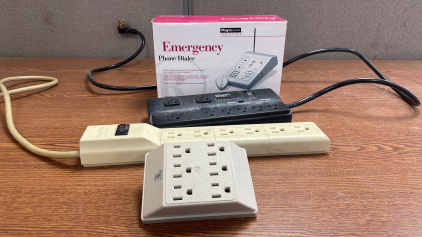 RADIOSHACK EMERGENCY PHONE DIALER AND POWER STRIPS