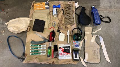 BACKPACKING/CAMPING KIT. TAZER, SHOOTING HEADPHONES, WATER CANTEENS , AND MORE!