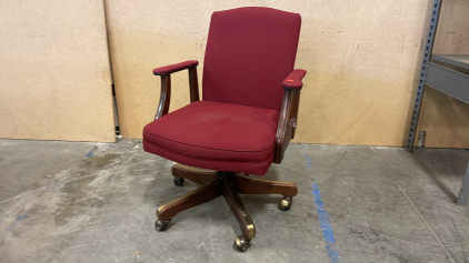 RED OFFICE CHAIR ON WHEELS