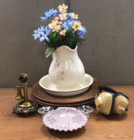 (1) Ceramic Vase With Matching Bottom Support, (1) Bundle of Faux Flowers, (1) Ceramic Shell Jewelry Holder, (2) Glass Candle Holders, (1) Vintage Candle Stick Telephone Display, And More