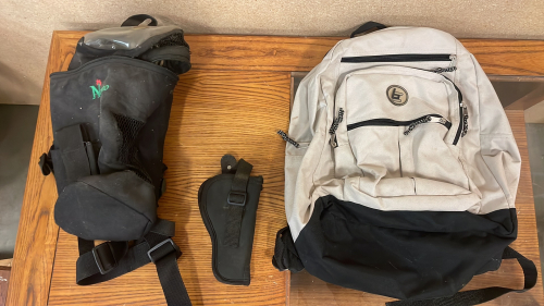 PISTOL HOLSTER, BACKPACK, AND NORCO OXYGEN TANK BAG