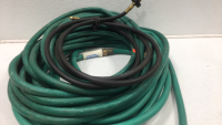 (1) 50’ Green Water Hose (1) Propane Hose with Hookup