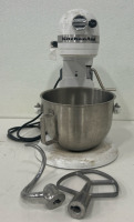 (1) Kitchen Aid Commercial Mixer (11) Cupcake Pans (1) Plastic Scoop (1) Rolling Tote - 2