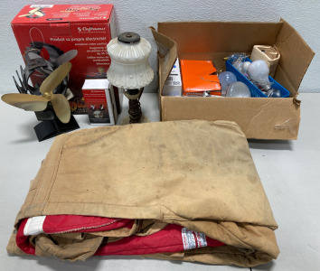 (1) Large Chest Long Inseam Coveralls, (1) Box of Assorted Lightbulbs, (1) Antique Bedside Lamp, (1) Car frame Ecofan for Wood Stoves and Replacement Motor