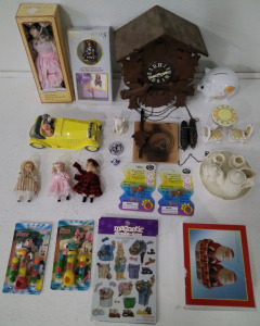 (1) Cuckoo Clock (1) Ceramic Car (2) Tea Sets (1) Doll & More