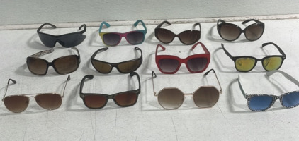 (1) Pair Woman’s Dolce And Gabbana Sun Glasses (11) Assorted Sun Glasses