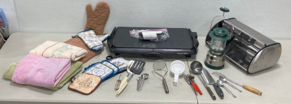 (1) Working Electric Lantern (1) Electric Griddle (1) Metal Breadbox (2) Oven Mitts (4) Oven Pads & More!