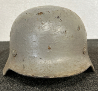 Vintage M40 WWII German Rolled Rim Helmet With Liner And Chinstraps