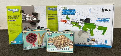 New In Box Zompers Splatter Blaster, RC Car, Game Parlor Chess Board, And Mischief Game Set