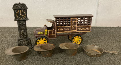 Vintage Cast Iron Delivery Truck New York-Philadelphia Junior Supply Co., (3) Rowoco Cast Iron Baking Muffin Cups, Cast Iron Grandfather Clock Bank, Lodge Cast Iron Ashtray