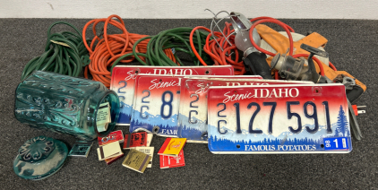 (4) Extension Cords, Shop Light, Matches In Glass Jar, Fishing Reel, Tape Measure Reel, And License Plates