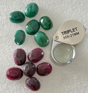 (6) Madagascar Faceted Ruby Gemstones, (6) Brazilian Emerald Cut And Faceted Gemstones, And 30x Jewelers Loupe