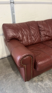 Maroon Leather Like Couch W/ Metal Rivet Accents ( 32”x 78”)