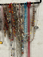 Variety Of Fashion Necklaces Displayed On A Velour Hanger - 3