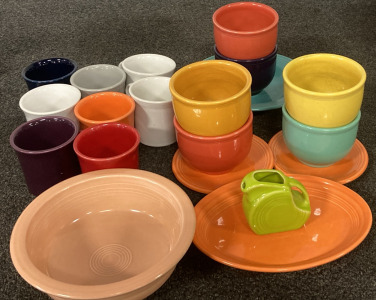 8 Assorted Color Cups, 6 Soup Bowls, 2 Small Plates, 1 Small Platter, 1 Salad Bowl/Plate, 1 Big Bowl and 1 Mini Disc Pitcher