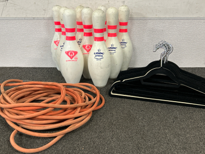 (9) Bowling Pins (1) Rigid Brand Hose & A Large Quantity Of Velour Clothing Hangers (Full Quantity In Separate Photo)