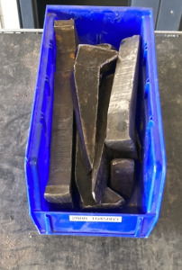 Bin of Metal Wedges