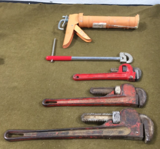 (3) Pipe Wrenches, (1) Basin Wrench, (1) Caulk Gun