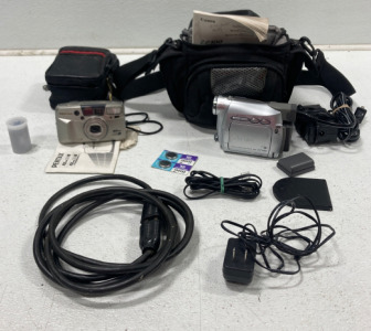 (1) Cannon Digital Camcorder NTSC ZR100 & Accessories (1) Pentax IQZoom 130M Camera & Accessories & More!