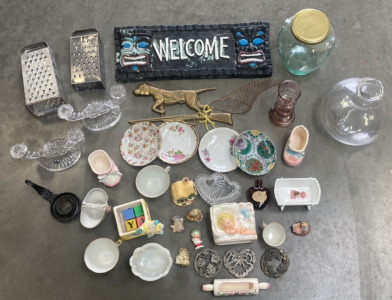 Welcome Sign, Large Glass Lidded Bottle, Large Glass Vase, Crystal Candle Stick Holders, Small Ceramic Figurines, (4) Decorative Plates & More