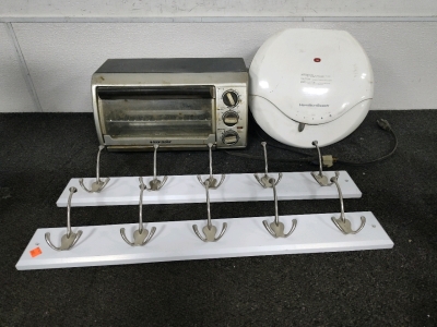 (1) Black & Deck Toaster oven (1) Hamilton Hamilton Grill (2) Coat Racks