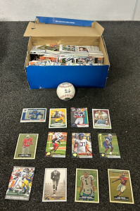 (1) Box Of Approximately (1000) MLB, NFL And NBA Cards Including Players Such As Vince Young, Glen Coffee, DeAngelo, Dennis Gentry, Joe Jacoby, C.J Spiller, Derrick Morgan, Heath Sherman And More, (1) Nolan Ryan Limited Addition Baseball