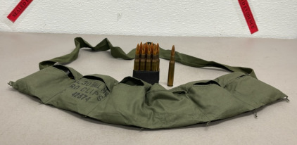 )1) Miltary Ammunition Belt W/ (6) Ammo Magazines W/ (48) Rounds Of 30-06 Ammunition Cartridges