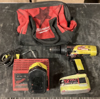 Milwaukee 12v Screw Driver w 2 batteries, charger, and bag